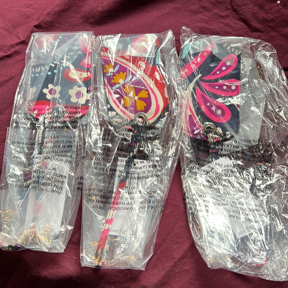 Lot of three brand new vera Bradley luggage tags